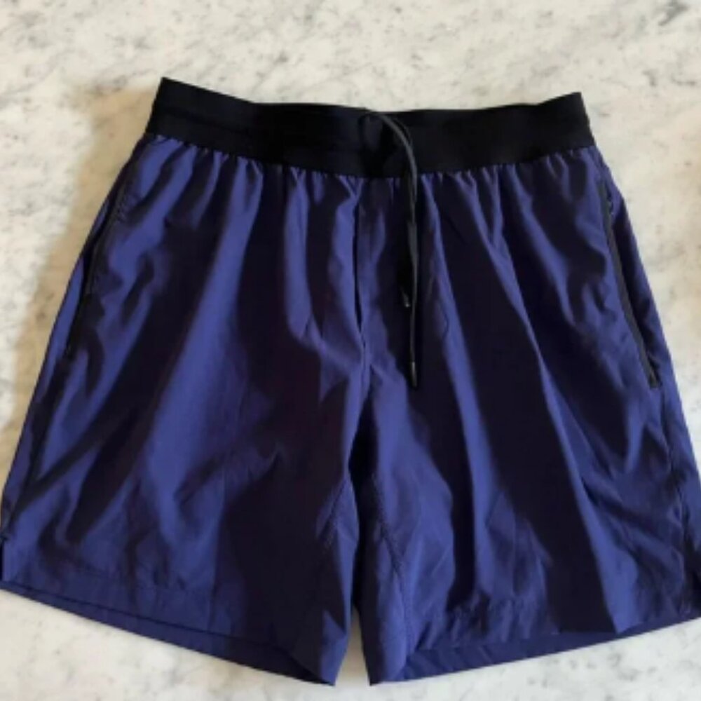 Rhone unlined athletic shorts 7” inseam